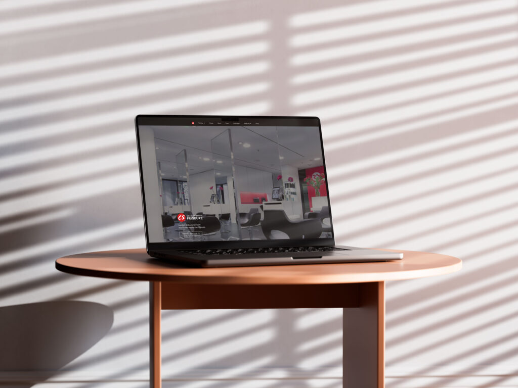 Christian Stinner Meisterfriseure Website auf einem MacBook, Referenzprojekt von heinmedia